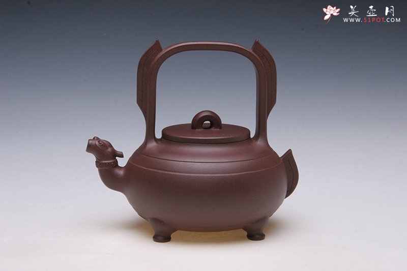 紫砂壶图片：螭龙提梁 - 宜兴紫砂壶网