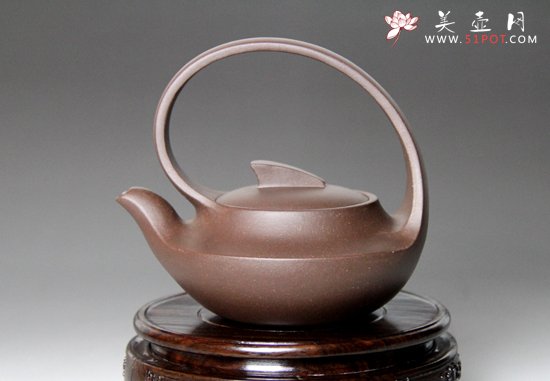 紫砂壶图片：提梁曲壶 - 宜兴紫砂壶网