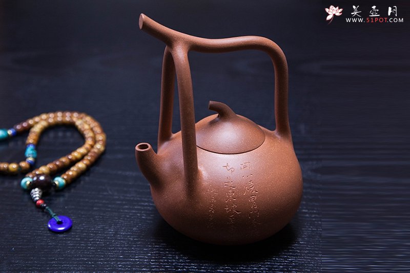 紫砂壶图片：茄瓜提梁壶 - 宜兴紫砂壶网