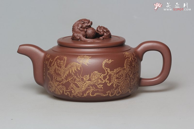 紫砂壶图片：九狮滚球遍地锦 - 宜兴紫砂壶网