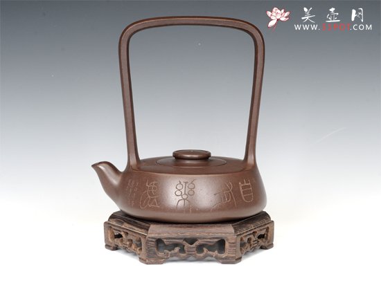 紫砂壶图片：此乐提梁 - 宜兴紫砂壶网