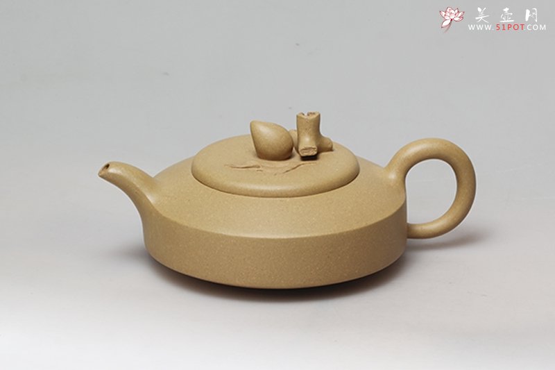 紫砂壶图片：寿桃扁石 - 宜兴紫砂壶网