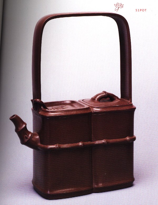 紫砂壶图片：双竹提梁壶 - 宜兴紫砂壶网