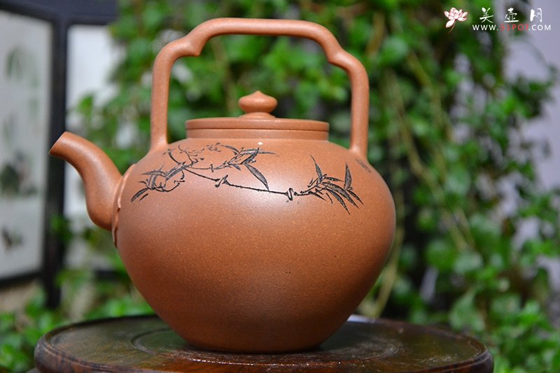 紫砂壶图片：吴经提梁 - 宜兴紫砂壶网