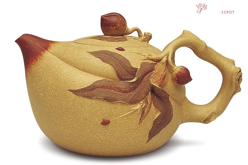紫砂壶图片：寿桃壶 - 宜兴紫砂壶网