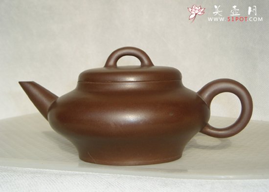 紫砂壶图片：虚扁壶 - 宜兴紫砂壶网