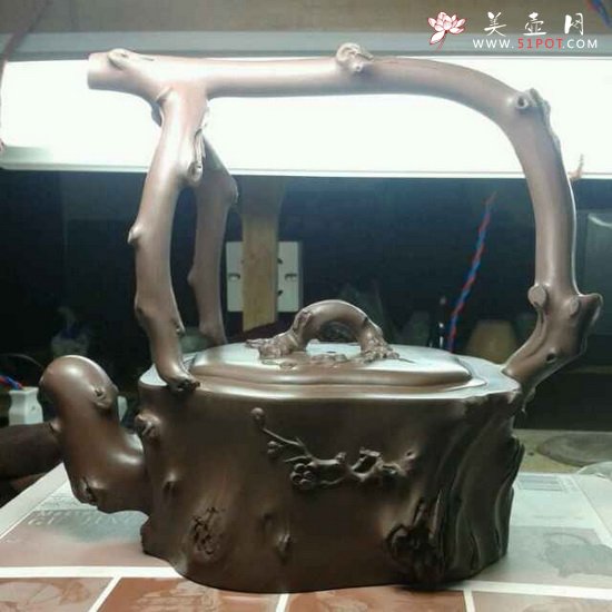 紫砂壶图片：梅花提梁 - 宜兴紫砂壶网