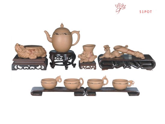 紫砂壶图片：龙生九子 - 宜兴紫砂壶网