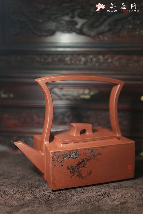 紫砂壶图片：包容提梁 - 宜兴紫砂壶网