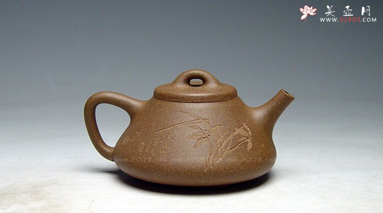 紫砂壶图片：梅兰竹菊《子冶套壶》容量：180cc，老段泥，木石装饰梅兰竹菊，全手工制作。 - 宜兴紫砂壶网