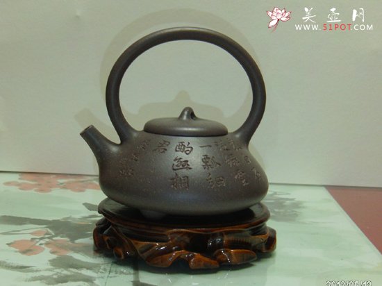 紫砂壶图片：曼生提梁 - 宜兴紫砂壶网