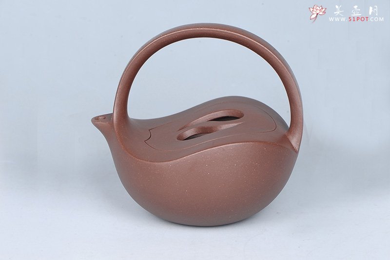 紫砂壶图片：太极提梁 - 宜兴紫砂壶网