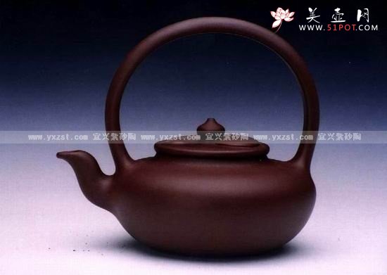 紫砂壶图片：太极提梁壶 - 宜兴紫砂壶网