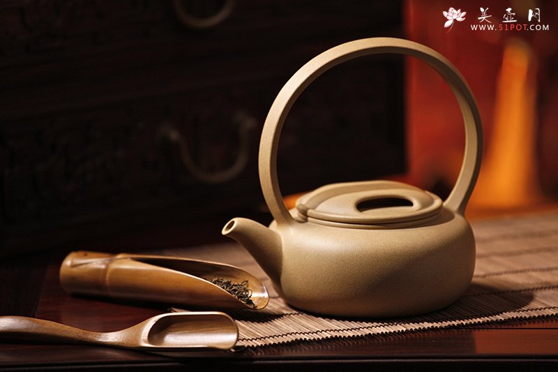 紫砂壶图片：牛盖提梁 - 宜兴紫砂壶网