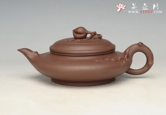 紫砂壶图片：圣桃虚扁 - 宜兴紫砂壶网