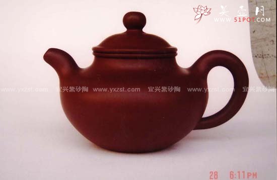 紫砂壶图片：倒把西施壶 - 宜兴紫砂壶网