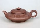 紫砂壶图片：百子虚扁 - 宜兴紫砂壶网