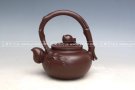 紫砂壶图片：寿桃提梁 - 宜兴紫砂壶网