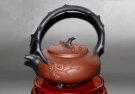 紫砂壶图片：寒梅提梁 - 宜兴紫砂壶网