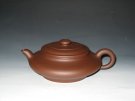 紫砂壶图片：虚扁 - 宜兴紫砂壶网