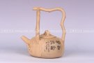 紫砂壶图片：提梁梅桩 - 宜兴紫砂壶网