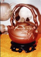 紫砂壶图片：五吼献寿提梁 - 宜兴紫砂壶网