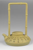 紫砂壶图片：八节提梁壶 - 宜兴紫砂壶网