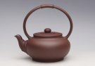 紫砂壶图片：包容提梁壶 - 宜兴紫砂壶网