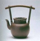 紫砂壶图片：红木龙蛋壶 - 宜兴紫砂壶网