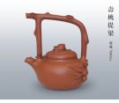 紫砂壶图片：寿桃提梁 - 宜兴紫砂壶网