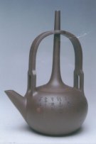 紫砂壶图片：顶天立地提梁壶 - 宜兴紫砂壶网