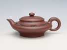 紫砂壶图片：虚扁 - 宜兴紫砂壶网