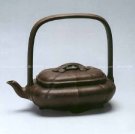 紫砂壶图片：菱花提梁壶 - 宜兴紫砂壶网