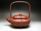紫砂壶图片：花棱提梁 - 宜兴紫砂壶网