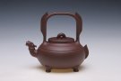 紫砂壶图片：螭龙提梁 - 宜兴紫砂壶网