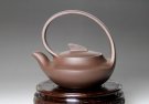 紫砂壶图片：提梁曲壶 - 宜兴紫砂壶网