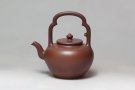 紫砂壶图片：吴经提梁 - 宜兴紫砂壶网