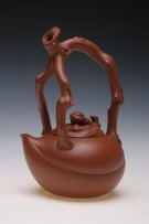 紫砂壶图片：仙桃提梁壶 - 宜兴紫砂壶网