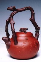 紫砂壶图片：东坡提梁壶 - 宜兴紫砂壶网