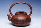 紫砂壶图片：牛盖提梁 - 宜兴紫砂壶网