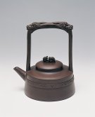 紫砂壶图片：双龙提梁 - 宜兴紫砂壶网