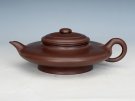 紫砂壶图片：虚扁 - 宜兴紫砂壶网