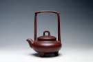 紫砂壶图片：玲珑提梁 - 宜兴紫砂壶网
