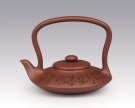 紫砂壶图片：曲意提梁 - 宜兴紫砂壶网