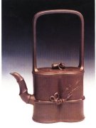 紫砂壶图片：双竹提梁壶 - 宜兴紫砂壶网