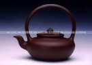 紫砂壶图片：太极提梁壶 - 宜兴紫砂壶网