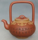 紫砂壶图片：吉庆组壶―吉庆提梁壶 - 宜兴紫砂壶网